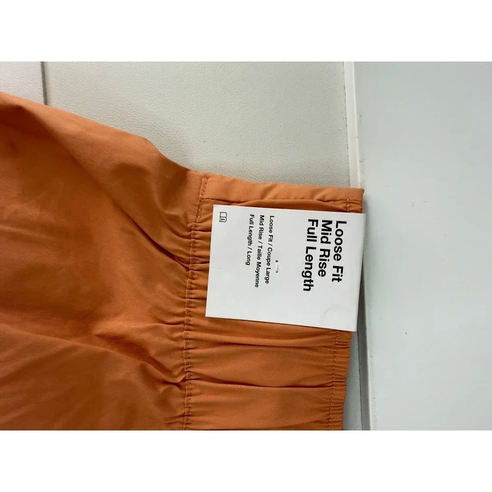 Nike Pleated Womens Loose Fit Mid Rise Woven Pants Monarch Orange Small NEW